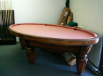 Similar to J.M Brunswick & Balke Co.'s Virginius Eleven Ball pool table — Oval Shaped Brunswick & Balke Billiard Table 1874