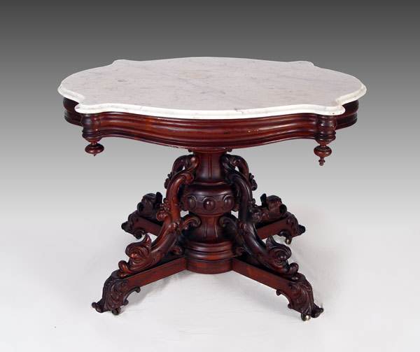 l036 1 — Belter? marble top table with dolphin feet