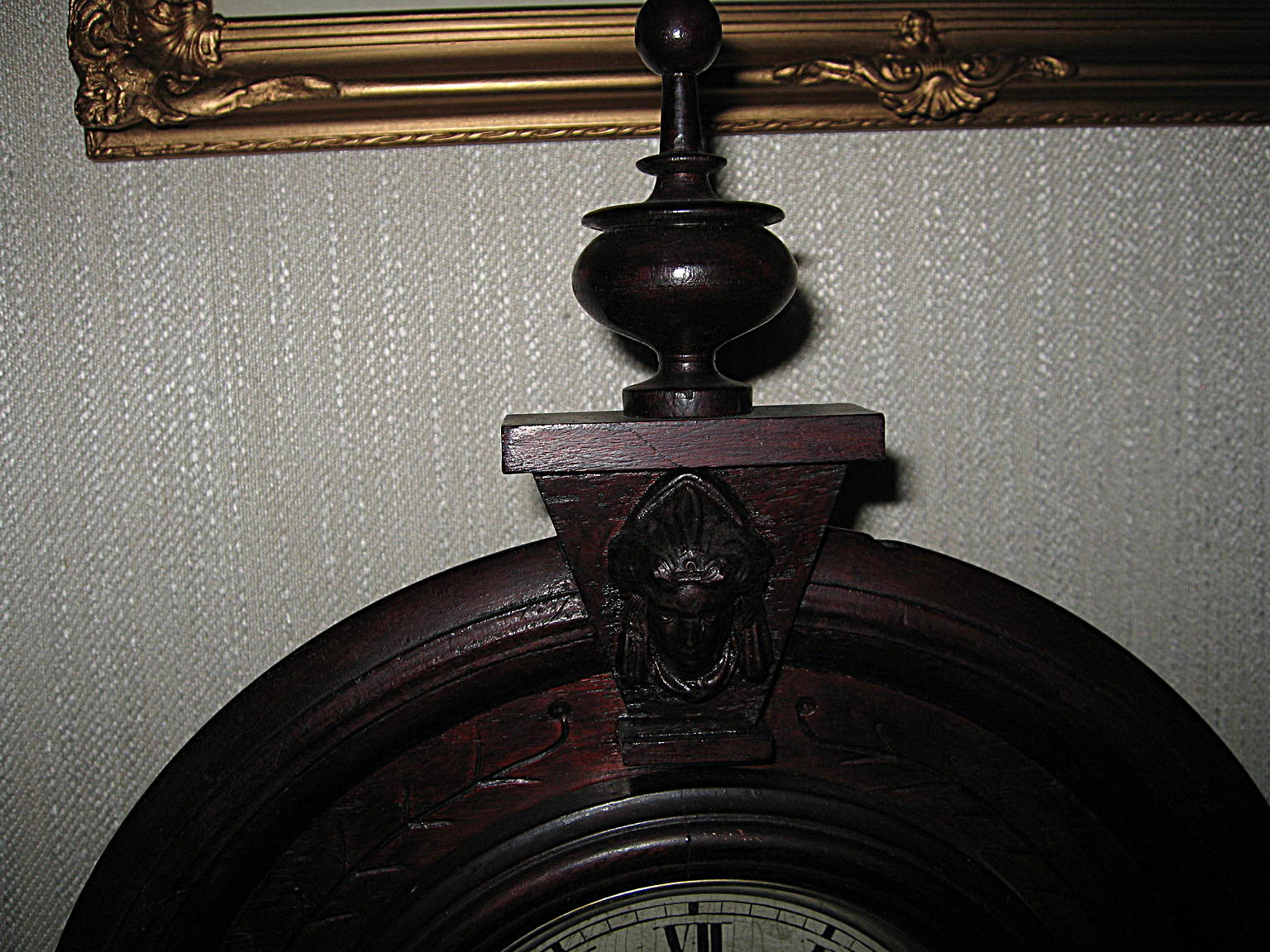 Jenny Lind Clock — Crest on parlor chair