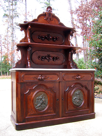 Sideboard 1 — Bronze plaques on cabinets - who made them?