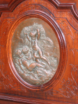 Sideboard 2 — Bronze plaques on cabinets - who made them?